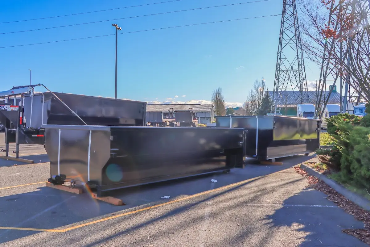 Roll-off dumpster ready for waste disposal at job site for 3 Yard Dumpster Rental in Agawam Town